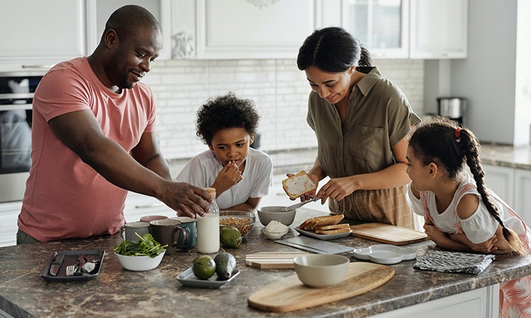 Immigrant family together in the kitchen